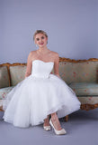 The Alba satin strapless Fifties style wedding gown with short chrin and tulle full skirt.