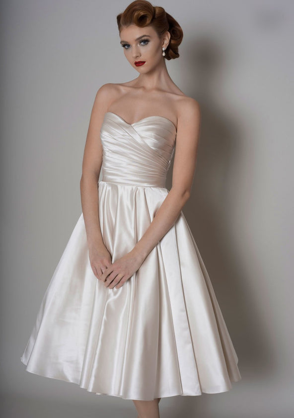 corseted strapless tea length wedding dress