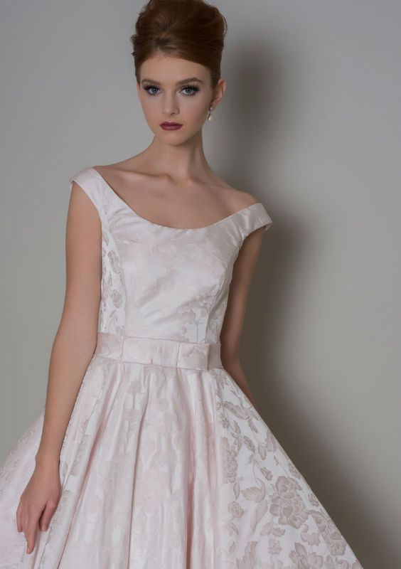 Close up of the Nora 50's inspired tea length wedding dress