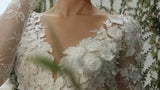 Video of the beautiful Kim white florals long sleeved bridal gown | al-kim
