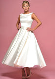 Ivory bridal satin tea length wedding gown with button detail back by Lou Lou.