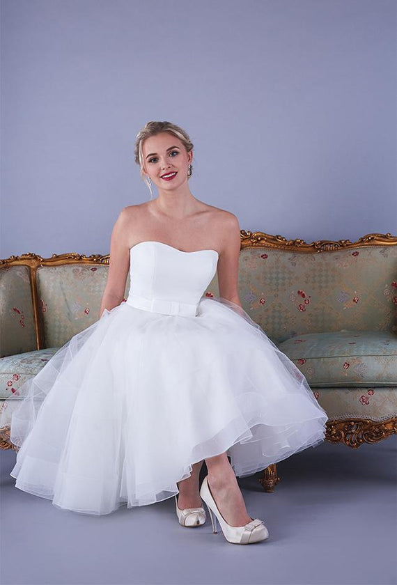 The Alba satin strapless Fifties style wedding gown with short chrin and tulle full skirt.