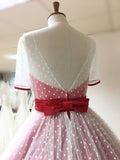 red bow back on Nellie tea length wedding gown.