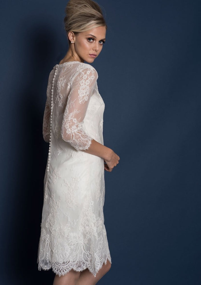 Side of Knee length classic 60's style silk duchess satin wedding dress