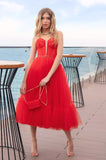 Red tea length bridal dress by Oksana Mukha
