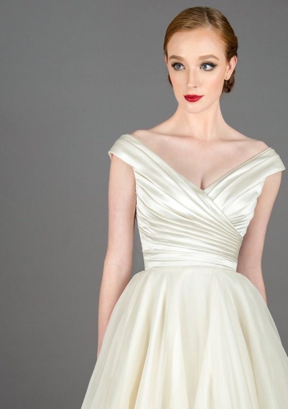 Satin bodice tea length wedding gown
