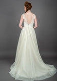 Full length wedding dress by Lou Lou with Boho style train.