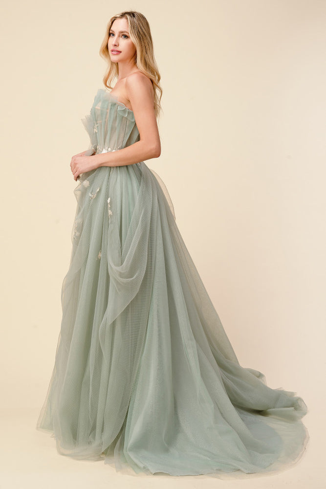 Sage alternative wedding or ball gown with delicate blossom details is made of beautifully draped plisse tulle that pleats over a nude corset bodice al-eloise