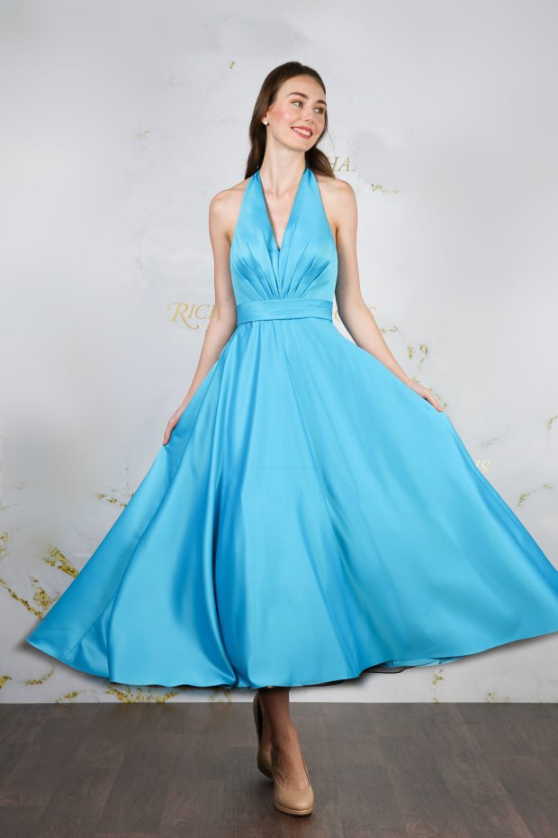 Tea length satin gown with full skirt, pleated halter bodice and low cut back | rd-carrie