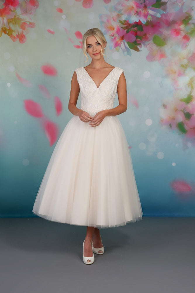 The Mabel is a stunning tea-length bridal gown  em-mabel