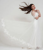 The full skirt of the Ava Boho style bridal gown by Freda Bennet