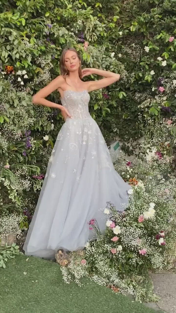 Video of the Selene constellation dream sweetheart embroidered and tulle bridal, prom or ball gown with a corset back.