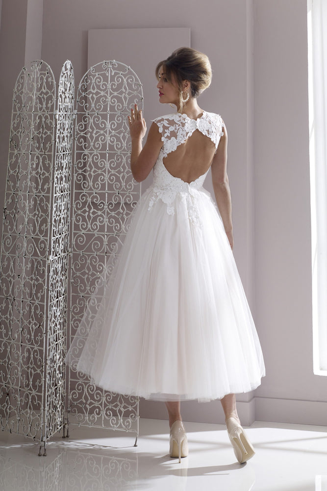 Back of lace and tulle tea length wedding gown