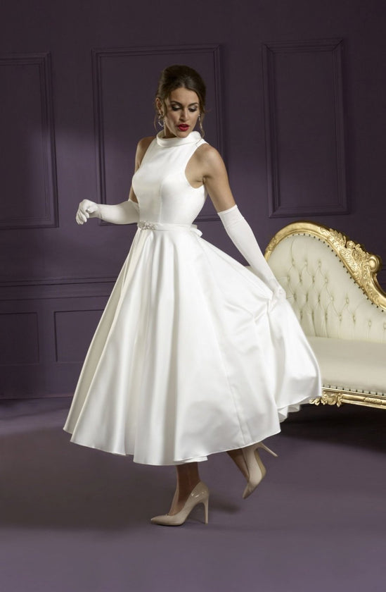 Tea length satin gown with 1 inch band over waistline and dressed buttons on neckline and over back zip.