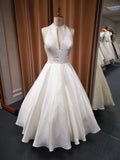 Mikado tea length bridal gown available in various colours