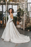 The wide train of the Heloise Mikado wedding gown