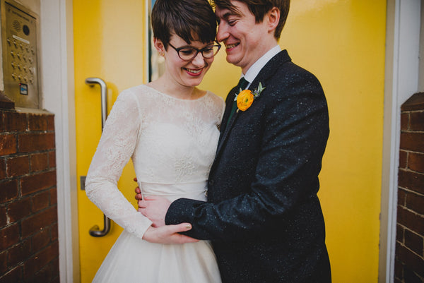Loving couple Lottie and Alex with Lottie wearing her Blanche dress.