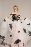 The full skirt of the strapless wedding gown with train in nude with black lace appliqué and soft black tulle - mg-jacqueline