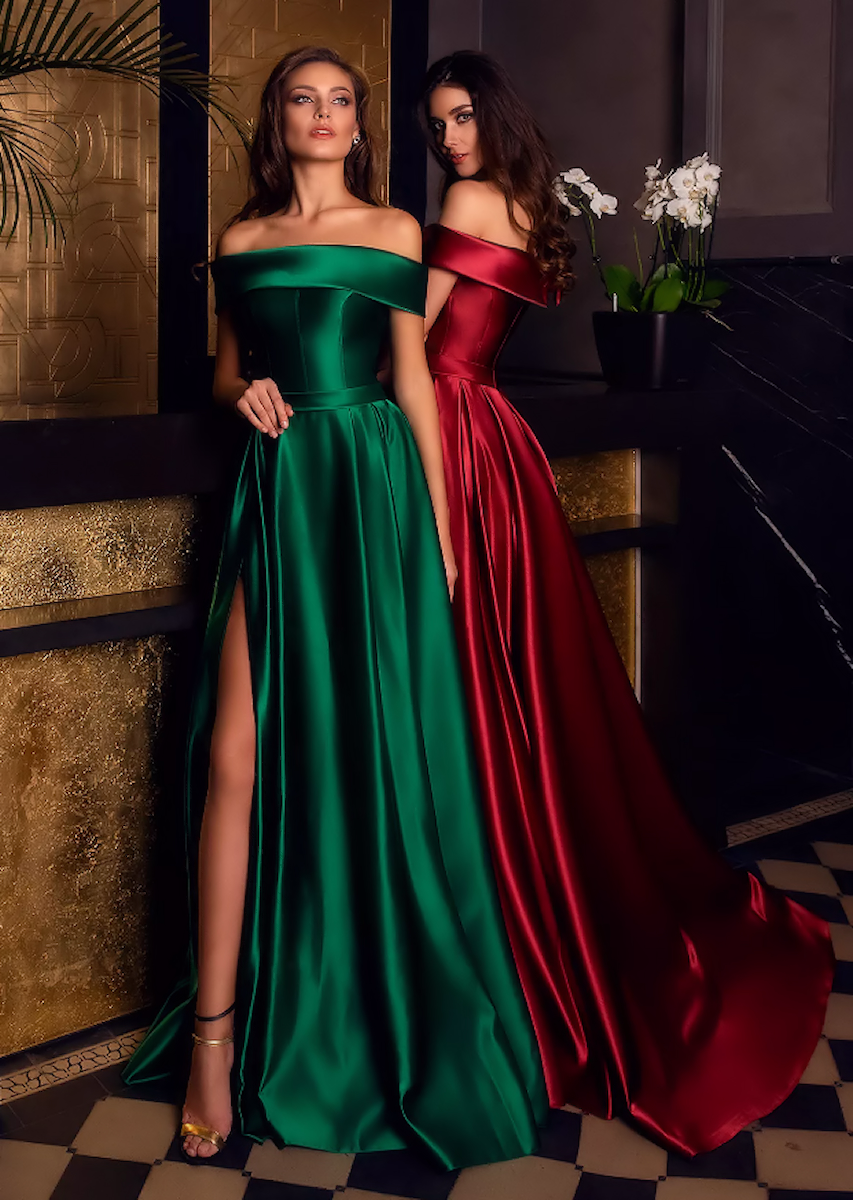 Full length heavy satin gown with dramatic though discreet side
