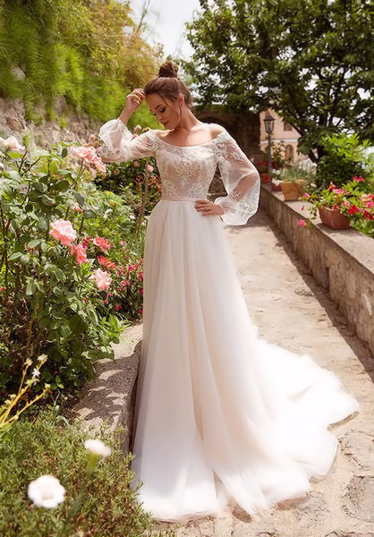 Romantic A-line wedding dress with lowered wide laced sleeves om-selena