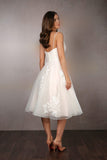 Back of pleated tulle tea length wedding dress with thin bodice straps | rd-iris