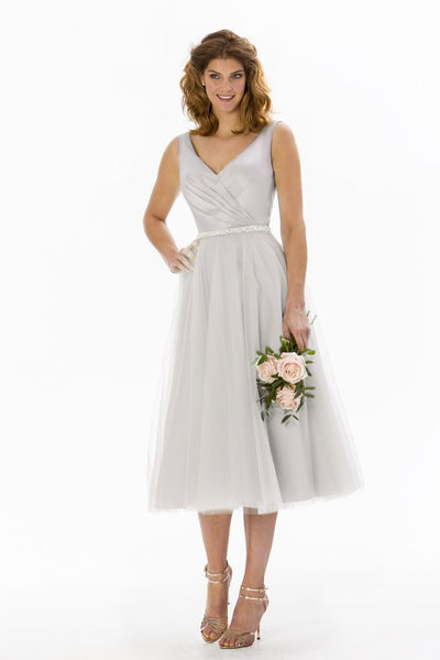 tb-ria Tea length wedding dress with plunge neck and full tulle skirt.
