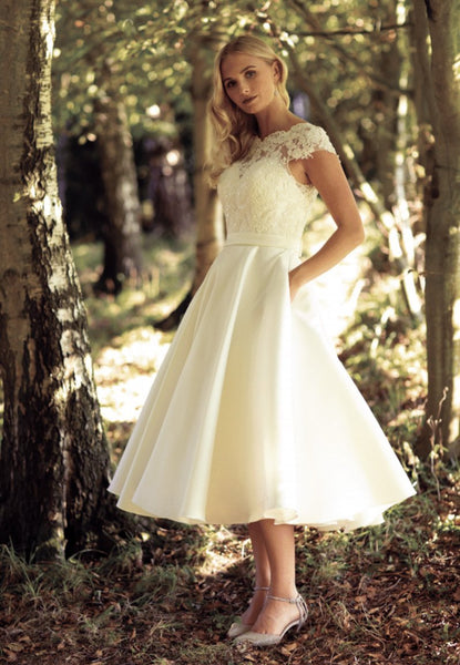 Sweetheart neckline tea length wedding gown