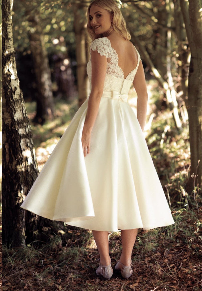 Back of sweetheart neckline tea length wedding gown