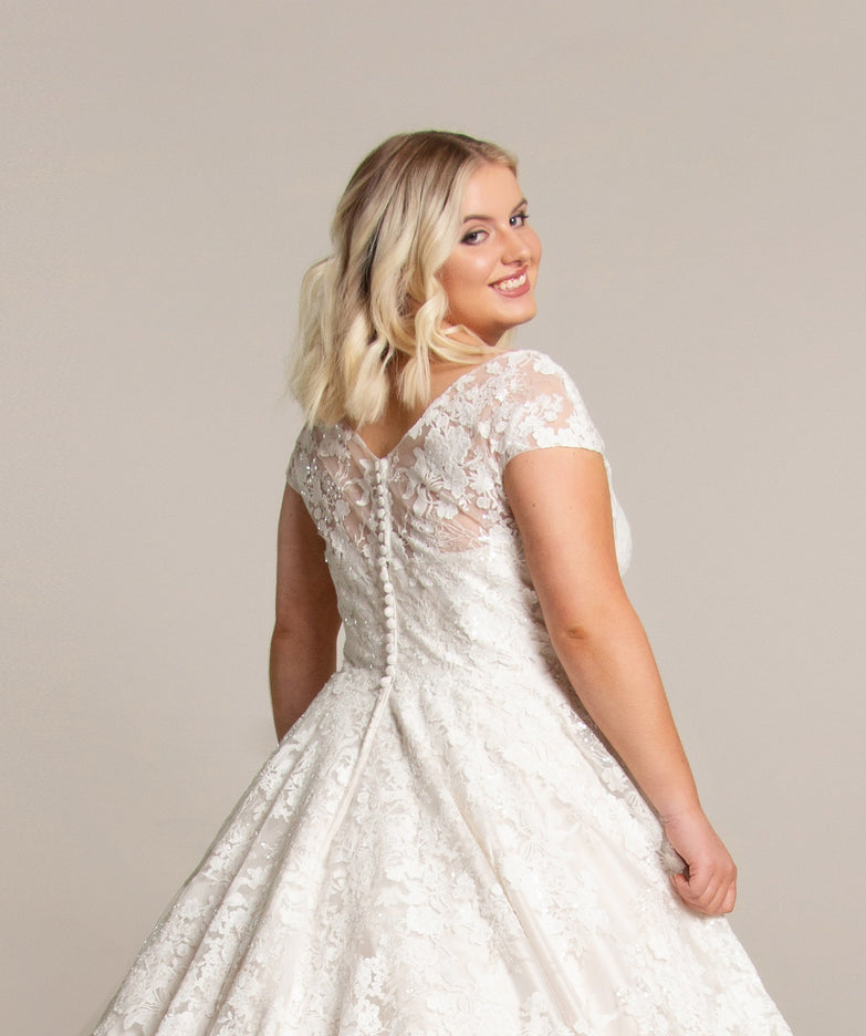 Back of tea length wedding dress in luxury lace and with a deep v neck bodice cut especially for curvy girls.  wr-belinda